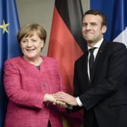 German Chancellor Angela Merkel welcomes French President Emmanuel Macron